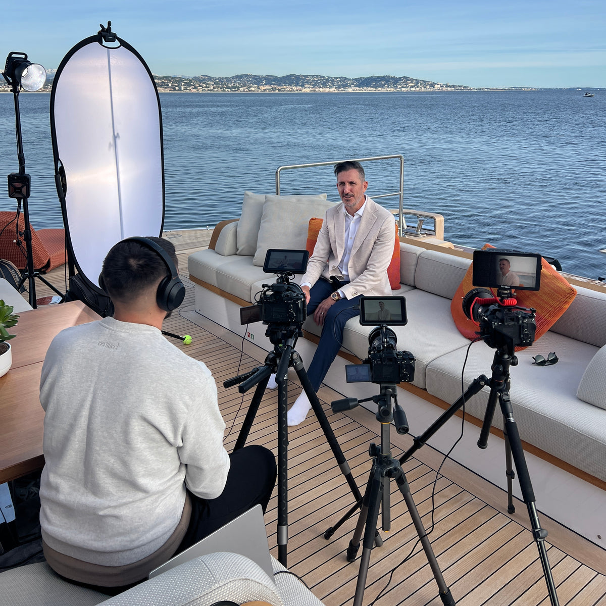 Seven Studios filming a multi-camera podcast interview on a superyacht
